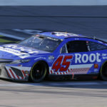 
              Bubba Wallace crosses the finish line to win a NASCAR Cup Series auto race at Kansas Speedway in Kansas City, Kan., Sunday, Sept. 11, 2022. (AP Photo/Colin E. Braley)
            