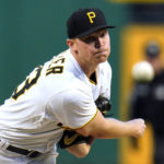 
              Pittsburgh Pirates starting pitcher Mitch Keller delivers during the first inning of the team's baseball game against the Cincinnati Reds in Pittsburgh, Tuesday, Sept. 27, 2022. (AP Photo/Gene J. Puskar)
            