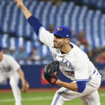 
              Toronto Blue Jays' starting pitcher Julian Merryweather throws to a Tampa Bay Rays batter in the first inning of the first baseball game of a doubleheader in Toronto, Tuesday, Sept. 13, 2022. (Jon Blacker/The Canadian Press via AP)
            