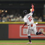 
              Atlanta Braves' Michael Harris II gestures as he runs the bases after hitting a solo home run during the sixth inning of the team's baseball game against the Seattle Mariners, Friday, Sept. 9, 2022, in Seattle. (AP Photo/Caean Couto)
            