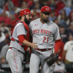 
              Cincinnati Reds catcher Austin Romine, left, and teammate Alexis Diaz (21) celebrate their victory over the St. Louis Cardinals in a baseball game on Thursday, Sept. 15, 2022, in St. Louis. (AP Photo/Joe Puetz)
            