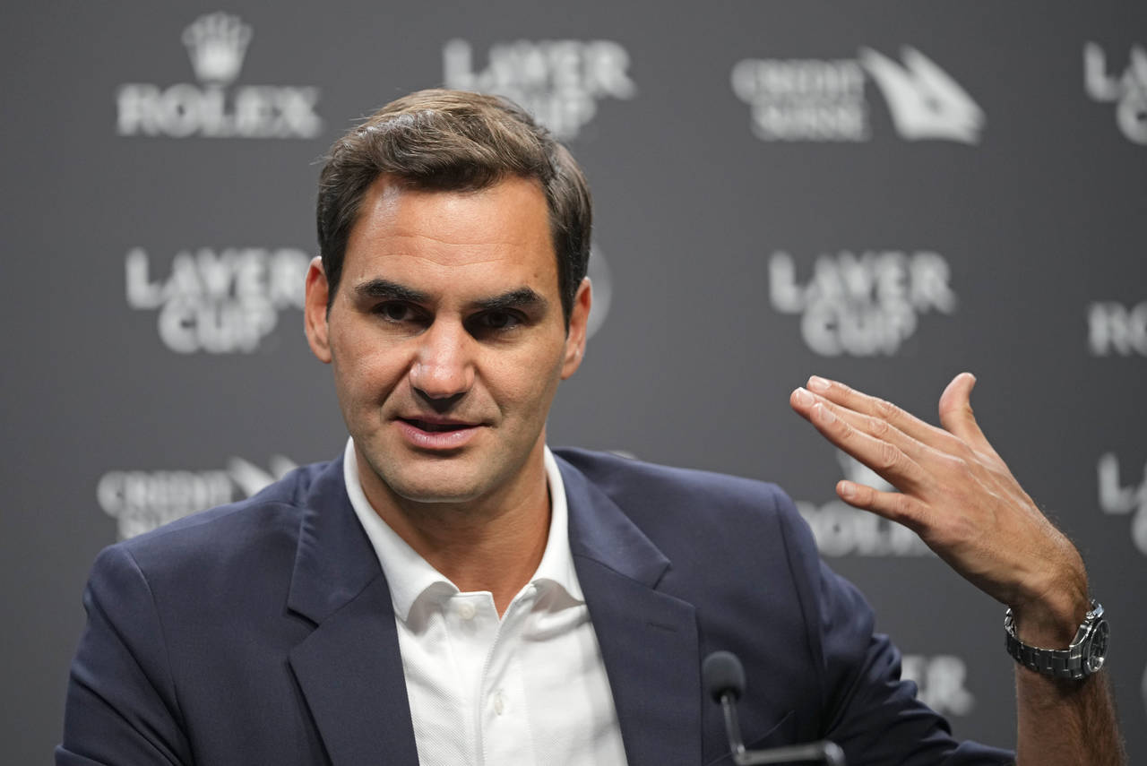 Switzerland's Roger Federer gestures during a media conference ahead of the Laver Cup tennis tourna...