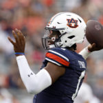 
              Auburn quarterback T.J. Finley warms up for the team's NCAA college football game against San Jose State on Saturday, Sept. 10, 2022, in Auburn, Ala. (AP Photo/Butch Dill)
            
