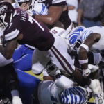 
              Mississippi State running back Jo'quavious Marks (7) dives across the goal line for a short touchdown run against Memphis during the first half of an NCAA college football game in Starkville, Miss., Saturday, Sept. 3, 2022. (AP Photo/Rogelio V. Solis)
            