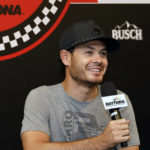 
              Kyle Larson answers a question from a reporter during a media availability before a NASCAR Cup Series auto race at Daytona International Speedway, Saturday, Aug. 27, 2022, in Daytona Beach, Fla. (AP Photo/Terry Renna)
            