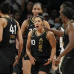 
              Las Vegas Aces guard Kelsey Plum (10) reacts after a play against the Seattle Storm during the second half in Game 1 of a WNBA basketball semifinal playoff series Sunday, Aug. 28, 2022, in Las Vegas. (AP Photo/John Locher)
            