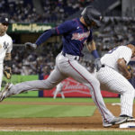 
              Minnesota Twins' Jake Cave is safe at first base beating New York Yankees pitcher Nestor Cortes to the bag during the eighth inning of a baseball game Thursday, Sept. 8, 2022, in New York. (AP Photo/Adam Hunger)
            