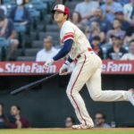 
              Los Angeles Angels' Shohei Ohtani watches his RBI double against the Seattle Mariners during the first inning of a baseball game in Anaheim, Calif., Saturday, Sept. 17, 2022. (AP Photo/Alex Gallardo)
            