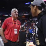 
              Bill Laimbeer congratulates Las Vegas Aces' A'ja Wilson, right, after her team's win in the WNBA basketball finals against the Connecticut Sun, Sunday, Sept. 18, 2022, in Uncasville, Conn. (AP Photo/Jessica Hill)
            