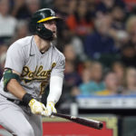 
              Oakland Athletics' Seth Brown watches his three-run home run against the Houston Astros during the fifth inning of a baseball game Saturday, Sept. 17, 2022, in Houston. (AP Photo/David J. Phillip)
            