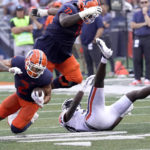 
              Illinois running back Chase Brown carries the ball during the second half of an NCAA college football game against Virginia Saturday, Sept. 10, 2022, in Champaign, Ill. Illinois won 24-3. (AP Photo/Charles Rex Arbogast)
            