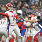 
              FILE - AFC quarterback Patrick Mahomes (15), of the Kansas City Chiefs passes against the NFC during the first half of the Pro Bowl NFL football game, Sunday, Feb. 6, 2022, in Las Vegas.  The NFL is replacing the Pro Bowl with weeklong skills competitions and a flag football game. The new event will be renamed “The Pro Bowl Games” and will feature AFC and NFC players showcasing their football and non-football skills in challenges over several days.   (AP Photo/David Becker, File )
            
