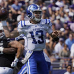 
              Duke quarterback Riley Leonard (13) looks to pass against Northwestern during the first half of an NCAA college football game, Saturday, Sept.10, 2022, in Evanston, Ill. (AP Photo/David Banks)
            