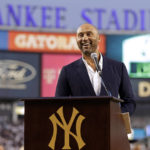 
              Baseball Hall of Famer Derek Jeter speaks during a ceremony honoring his Hall of Fame induction last year, before a baseball game between the Tampa Bay Rays and the New York Yankees on Friday, Sept. 9, 2022, in New York. (AP Photo/Adam Hunger)
            