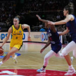 
              Australia's Steph Talbot runs at the Serbia defense during their game at the women's Basketball World Cup in Sydney, Australia, Sunday, Sept. 25, 2022. (AP Photo/Mark Baker)
            