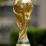 
              FILE - The FIFA World Cup soccer trophy is displayed Thursday, June 16, 2022, in New York. German top division soccer club Hoffenheim is skipping this year's World Cup in Qatar. The club says on Thursday, Sept. 22, 2022, that it will not give any coverage to this year’s World Cup. (AP Photo/Noah K. Murray, File)
            