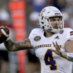 
              Tennessee Tech quarterback Jeremiah Oatsvall (4) looks to pass during the first half of an NCAA college football game against Kansas Friday, Sept. 2, 2022, in Lawrence, Kan. (AP Photo/Charlie Riedel)
            