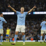 
              Manchester City's Erling Haaland, centre, celebrates after scoring his side's third goal during the English Premier League soccer match between Manchester City and Nottingham Forest at Etihad Stadium in Manchester, England, Wednesday, Aug 31, 2022. (AP Photo/Dave Thompson)
            