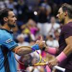 
              Rafael Nadal, right, of Spain, shakes hands with Fabio Fognini, of Italy, after defeating him during the second round of the U.S. Open tennis championships, Friday, Sept. 2, 2022, in New York. (AP Photo/Frank Franklin II)
            