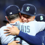 TORONTO, ON - OCTOBER 07:  Luis Castillo #21 of the Seattle Mariners celebrates the win with Manager Scott Servais following Game One of the AL Wild Card series against the Toronto Blue Jays at Rogers Centre on October 7, 2022 in Toronto, Ontario, Canada.  (Photo by Vaughn Ridley/Getty Images)