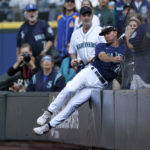 SEATTLE, WASHINGTON - OCTOBER 01: Adam Frazier #26 of the Seattle Mariners catches a foul ball for an out against the Oakland Athletics during the fourth inning at T-Mobile Park on October 01, 2022 in Seattle, Washington. (Photo by Steph Chambers/Getty Images)