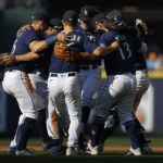 SEATTLE, WASHINGTON - OCTOBER 01: The Seattle Mariners celebrate their 5-1 win against the Oakland Athletics at T-Mobile Park on October 01, 2022 in Seattle, Washington. (Photo by Steph Chambers/Getty Images)