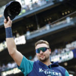 SEATTLE, WASHINGTON - OCTOBER 01: Cal Raleigh #29 of the Seattle Mariners acknowledges the crowd before the game against the Oakland Athletics at T-Mobile Park on October 01, 2022 in Seattle, Washington. (Photo by Steph Chambers/Getty Images)