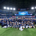 TORONTO, ONTARIO - OCTOBER 08: The Seattle Mariners celebrate after defeating the Toronto Blue Jays in game two to win the American League Wild Card Series at Rogers Centre on October 08, 2022 in Toronto, Ontario. The Seattle Mariners defeated the Toronto Blue Jays with a score of 10 to 9. (Photo by Vaughn Ridley/Getty Images)