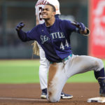 HOUSTON, TEXAS - OCTOBER 11: Julio Rodriguez #44 of the Seattle Mariners celebrates his triple against the Houston Astros during the fourth inning in game one of the American League Division Series at Minute Maid Park on October 11, 2022 in Houston, Texas. (Photo by Carmen Mandato/Getty Images)