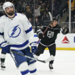 
              Los Angeles Kings center Blake Lizotte, right, celebrates after scoring a goal during the second period of an NHL hockey game against the Tampa Bay Lightning Tuesday, Oct. 25, 2022, in Los Angeles. Tampa Bay Lightning left wing Pat Maroon (14) reacts. (AP Photo/Ashley Landis)
            