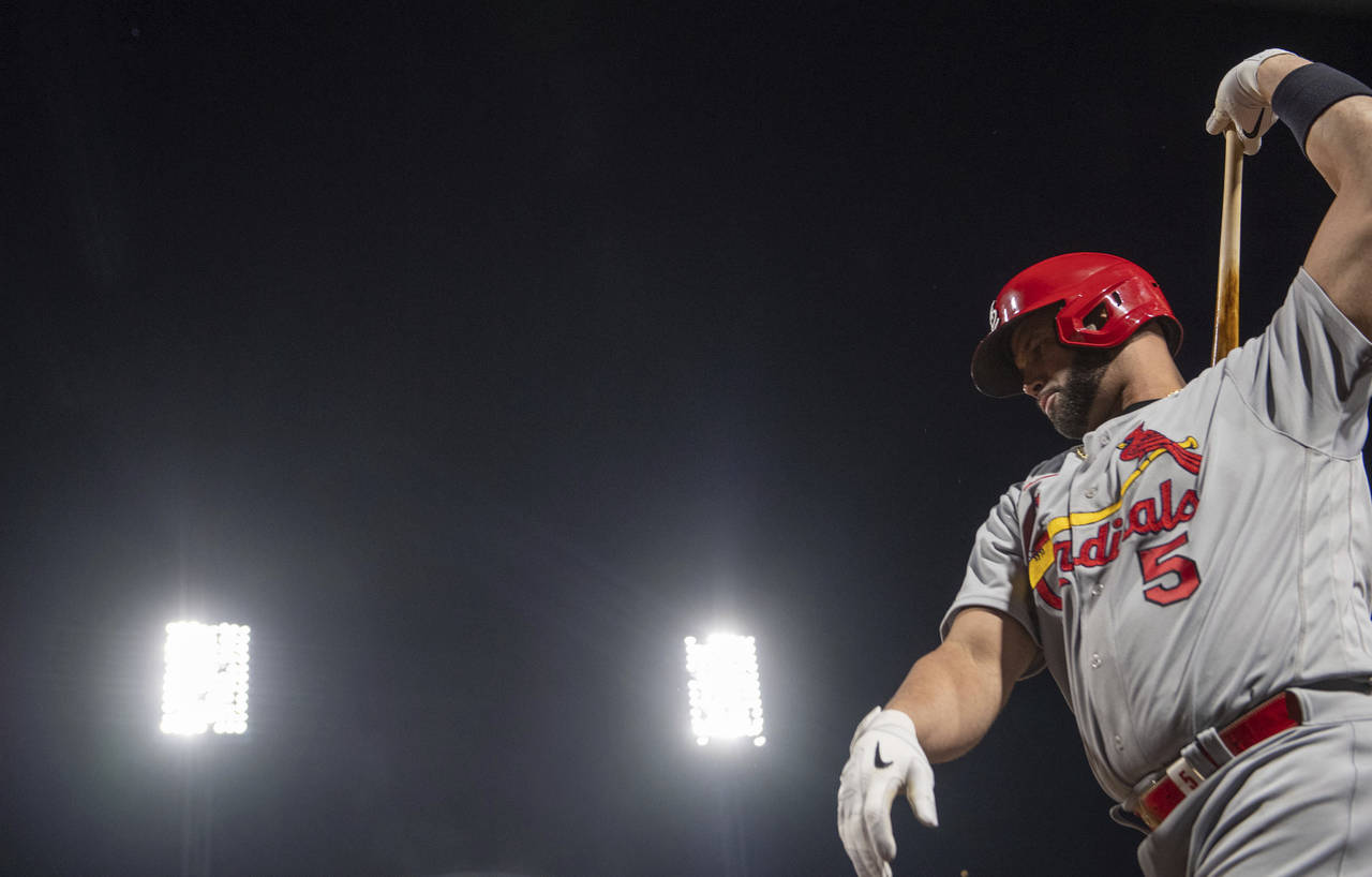 The Cardinals' Albert Pujols warms up before stepping up to the plate on Monday, Oct. 3, 2022, at a...