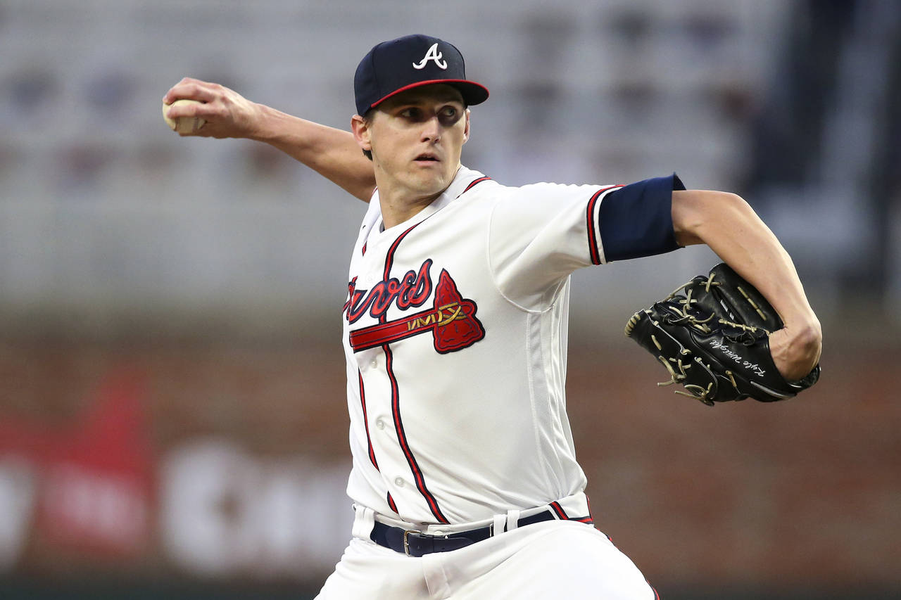 Atlanta Braves starting pitcher Kyle Wright throws during the first inning of the team's baseball g...