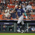 
              Seattle Mariners shortstop J.P. Crawford (3) celebrates his solo home run against Houston Astros starting pitcher Justin Verlander during the fourth inning in Game 1 of an American League Division Series baseball game in Houston,Tuesday, Oct. 11, 2022. (AP Photo/David J. Phillip)
            