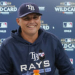 
              Tampa Bay Rays manager Kevin Cash smiles during an interview, Thursday, Oct. 6, 2022, in Cleveland, the day before their wild card baseball playoff game against the Cleveland Guardians. (AP Photo/Sue Ogrocki)
            