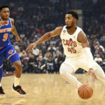 
              Cleveland Cavaliers guard Donovan Mitchell (45) drives during the first half of an NBA basketball game against the New York Knicks, Sunday, Oct. 30, 2022, in Cleveland. (AP Photo/Nick Cammett)
            