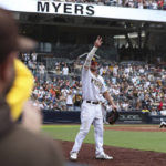 
              San Diego Padres' Wil Myers waves to the crowd after being removed in the eighth inning of a baseball game against the San Francisco Giants, Wednesday, Oct. 5, 2022, in San Diego. (AP Photo/Derrick Tuskan)
            