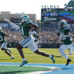 
              RETRANSMISSION TO CORRECT ID TO JHA'QUAN JACKSON - Tulane wide receiver Jha'Quan Jackson (4) returns a kickoff to score a touchdown during the first half an NCAA college football against Memphis in New Orleans, Saturday, Oct. 22, 2022. (AP Photo/Tyler Kaufman)
            