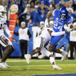 
              Kentucky running back Chris Rodriguez Jr. (24) is tackled into the end zone for a touchdown by Mississippi State defensive end Jordan Davis during the second half of an NCAA college football game in Lexington, Ky., Saturday, Oct. 15, 2022. (AP Photo/Michael Clubb)
            