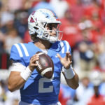 
              Mississippi quarterback Jaxson Dart (2) looks to pass during the first half of an NCAA college football game against Kentucky in Oxford, Miss., Saturday, Oct. 1, 2022. (AP Photo/Thomas Graning)
            