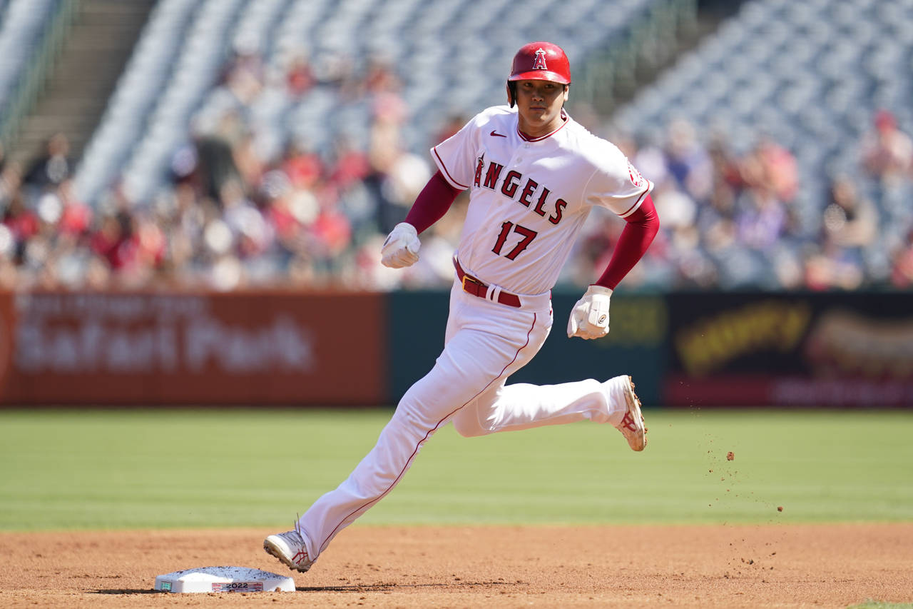 Los Angeles Angels designated hitter Shohei Ohtani (17) rounds second on a single hit by Taylor War...