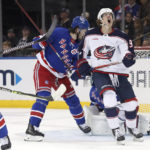 
              Columbus Blue Jackets center Kent Johnson (91) reacts after missing a shot on goal against the New York Rangers during the second period of an NHL hockey game, Sunday, Oct. 23, 2022, in New York. (AP Photo/Noah K. Murray)
            