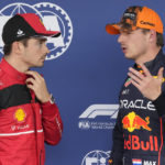 
              Red Bull driver Max Verstappen of the Netherlands, right, talks with Ferrari driver Charles Leclerc of Monaco after the qualifying session of the Japanese Formula One Grand Prix at the Suzuka Circuit in Suzuka, central Japan, Saturday, Oct. 8, 2022. (AP Photo/Eugene Hoshiko)
            