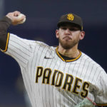 
              San Diego Padres starting pitcher Joe Musgrove works against a San Francisco Giants batter during the first inning of a baseball game Monday, Oct. 3, 2022, in San Diego. (AP Photo/Gregory Bull)
            