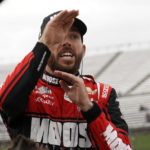 
              Ross Chastain gestures as he talks to a crew member during practice for the NASCAR auto race at Martinsville Speedway, Saturday, Oct. 29, 2022, in Martinsville, Va. (AP Photo/Chuck Burton)
            