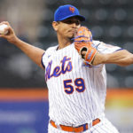 
              New York Mets' Carlos Carrasco pitches against the Washington Nationals during the first inning in the first baseball game of a doubleheader Tuesday, Oct. 4, 2022, in New York. (AP Photo/Frank Franklin II)
            