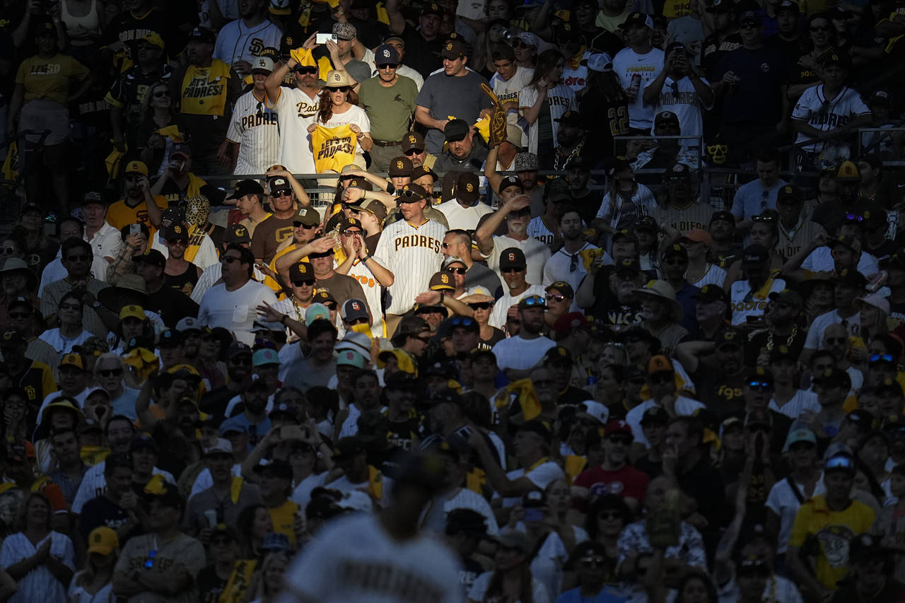 Fans watch during the ninth inning in Game 2 of the baseball NL Championship Series between the San...