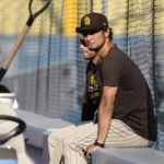
              San Diego Padres' Yu Darvish, right, sits during baseball practice Monday, Oct. 10, 2022, in Los Angeles for the National League division series against the Los Angeles Dodgers. (AP Photo/Mark J. Terrill)
            