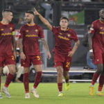 
              AS Roma's Paulo Dybala celebrates after scoring to 1-0 during the Europa League soccer match between AS Roma and Real Betis in Rome, Italy, Thursday, Oct. 6, 2022. (Alfredo Falcone/LaPresse via AP)
            