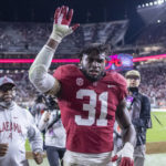 
              FILE - Alabama linebacker Will Anderson Jr. (31) waves to fans as he leaves the field after the team's win over Texas A&M in an NCAA college football game Saturday, Oct. 8, 2022, in Tuscaloosa, Ala. Anderson was selected the top defensive player in the Associated Press SEC Midseason Awards, Wednesday, Oct. 12, 2022. (AP Photo/Vasha Hunt, File)
            