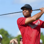 
              FILE - Tiger Woods follows his ball at the fourth tee during the last round of the Hero World Challenge at Albany Golf Club in Nassau, Bahamas, Saturday, Dec. 7, 2019. Tiger Woods has another loaded field for his Hero World Challenge in the Bahamas. Woods on Tuesday, Oct. 4, 2022, announced 17 players for the 20-man field, and all but four are from the top 21 in the world ranking. Still to be announced is whether the player at No. 1,195 in the world — Woods — will tee it up at Albany.(AP Photo/Dante Carrer, File)
            